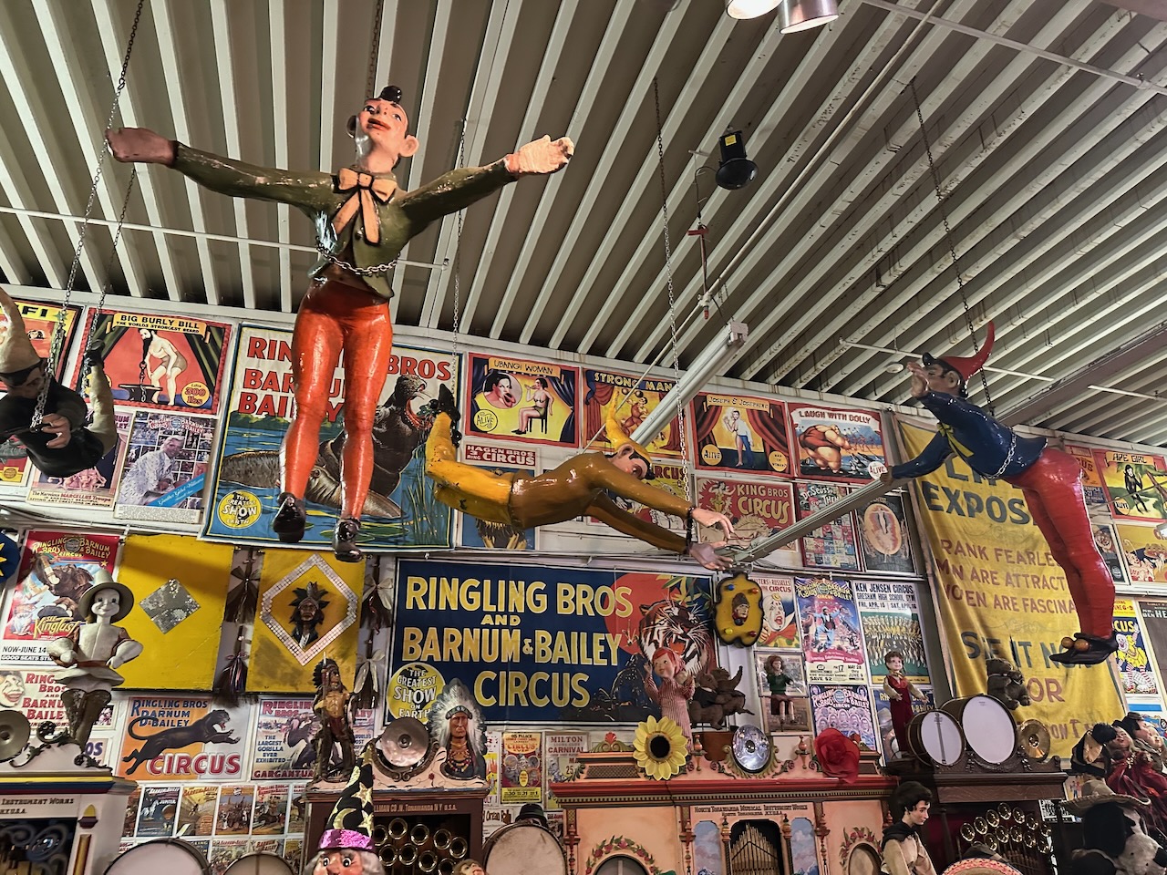 Circus performer dolls hanging from ceiling