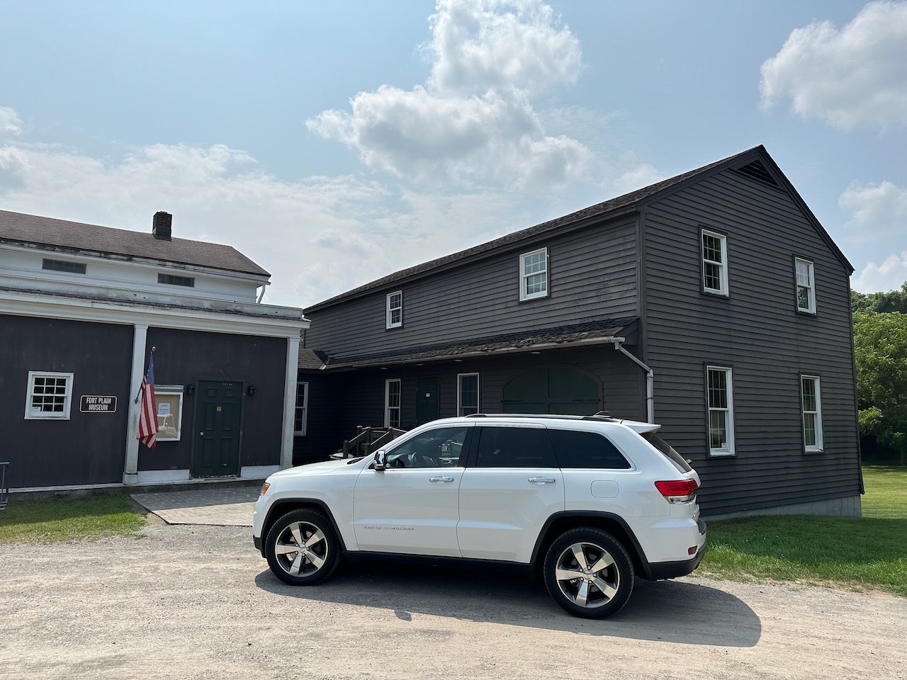 2014 Jeep Grand Cherokee parked in front of Fort Plain Museum. 