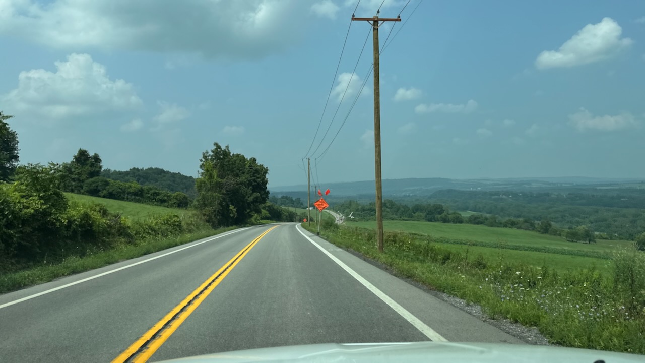 View of Highway 5S in New York, with mountains in distance.