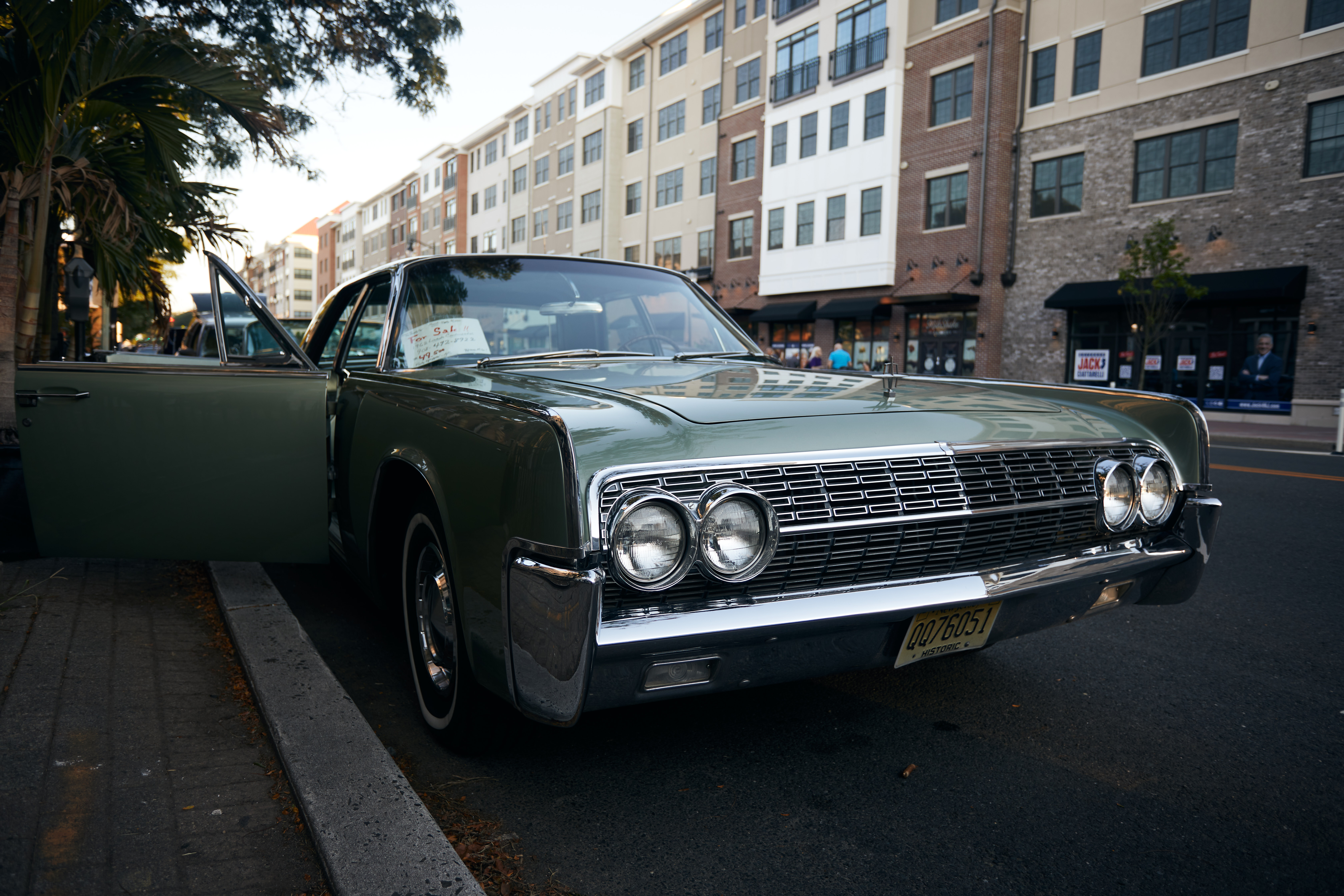 Lincoln Continental with passenger doors open.