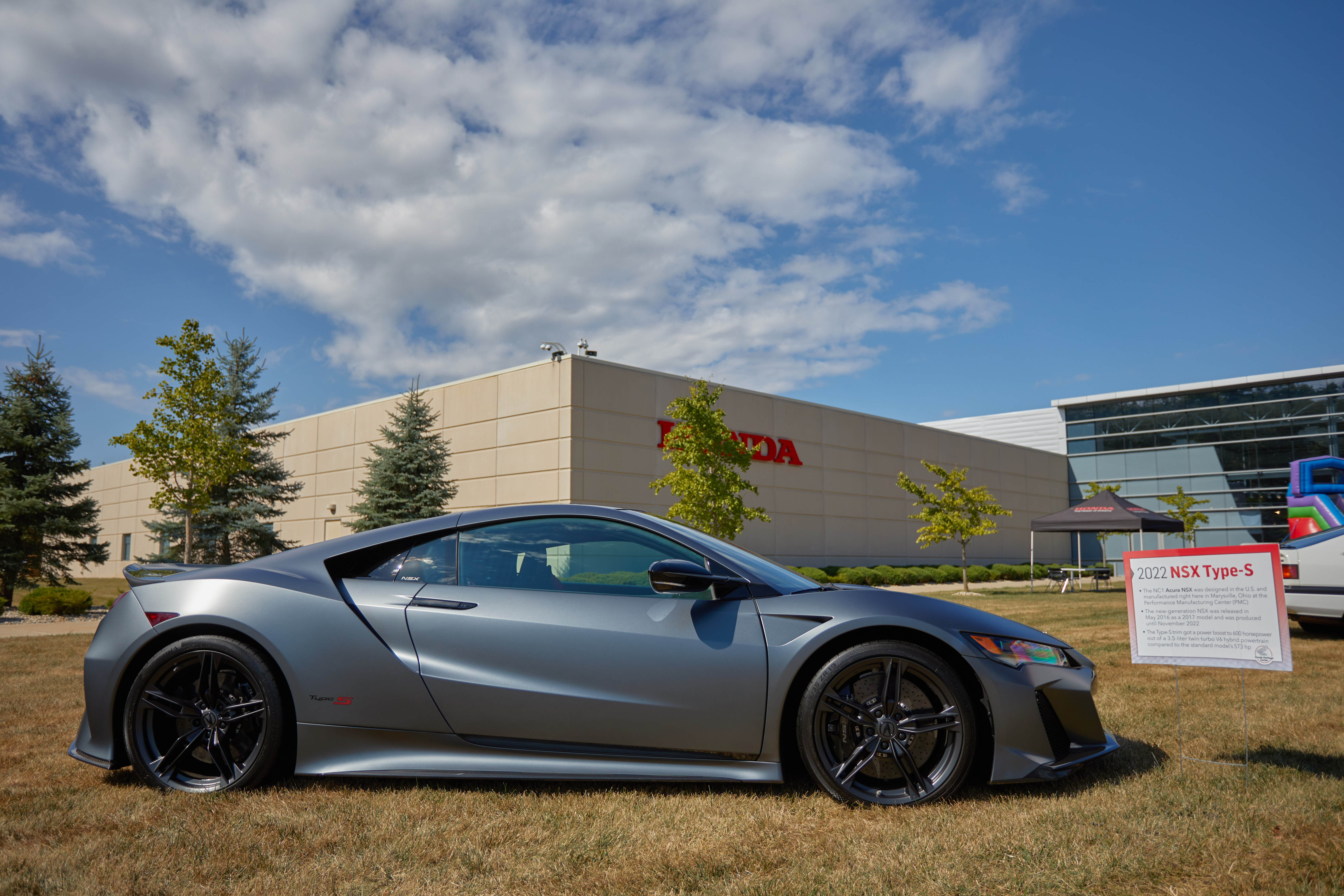 2nd generation Acura NSX on lawn in front of Honda Heritage Center.