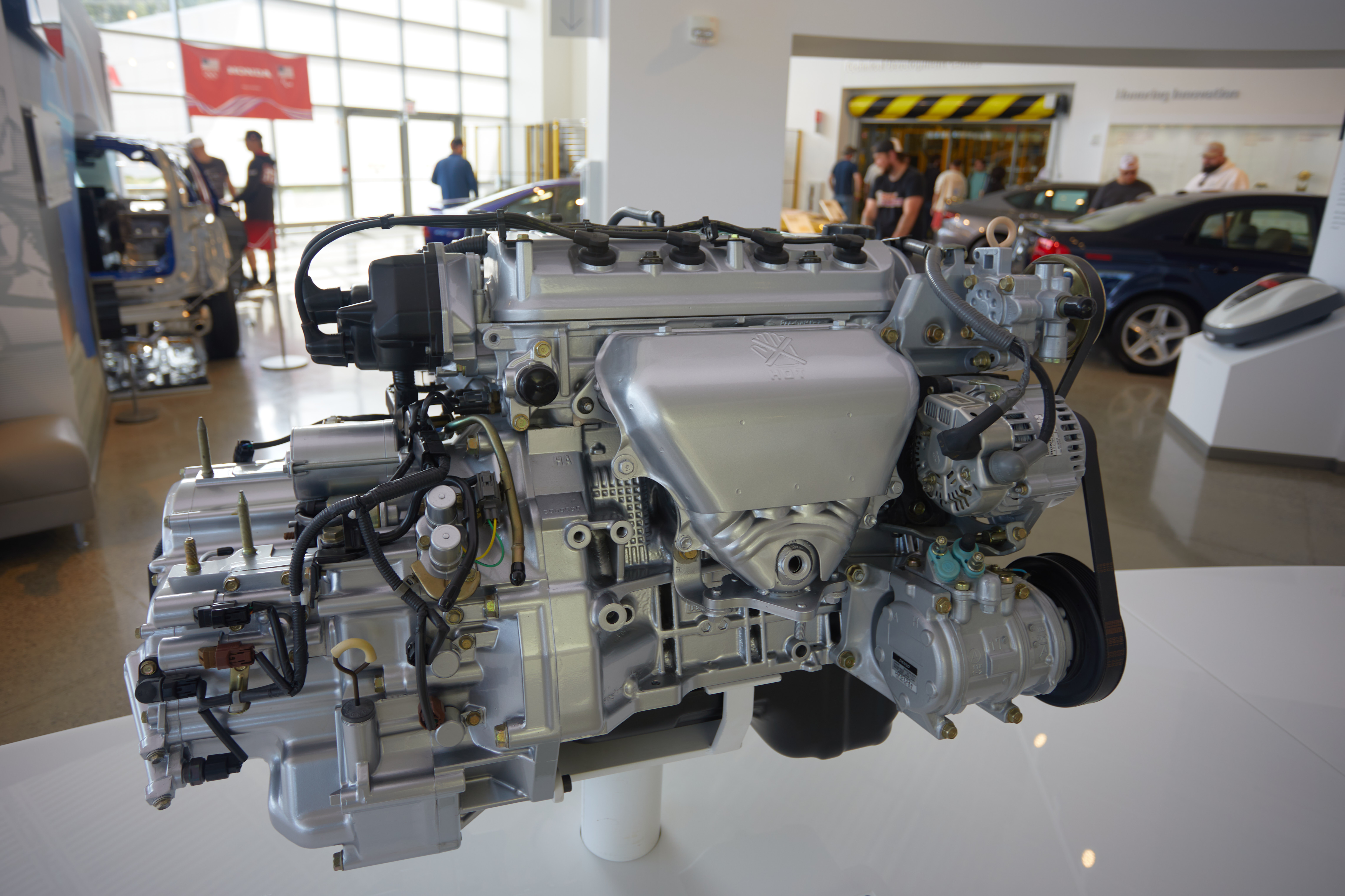 Honda F23 four-cylinder motor on display.