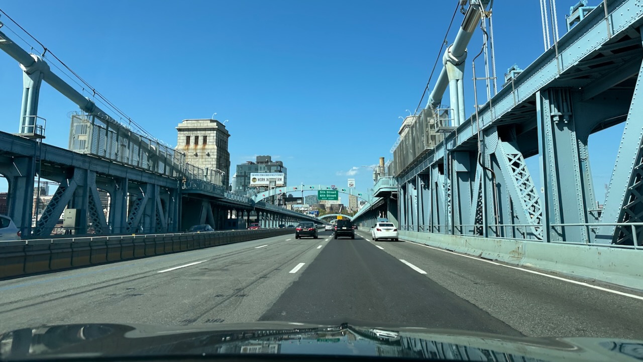 View of Ben Franklin Bridge from behind windshield of 2020 Acura TLX.