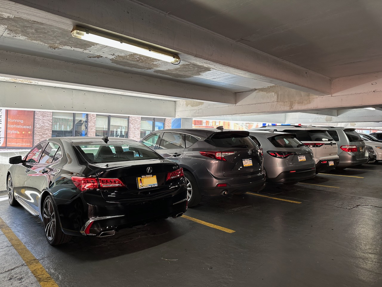 2020 Acura TLX parked in parking garage.