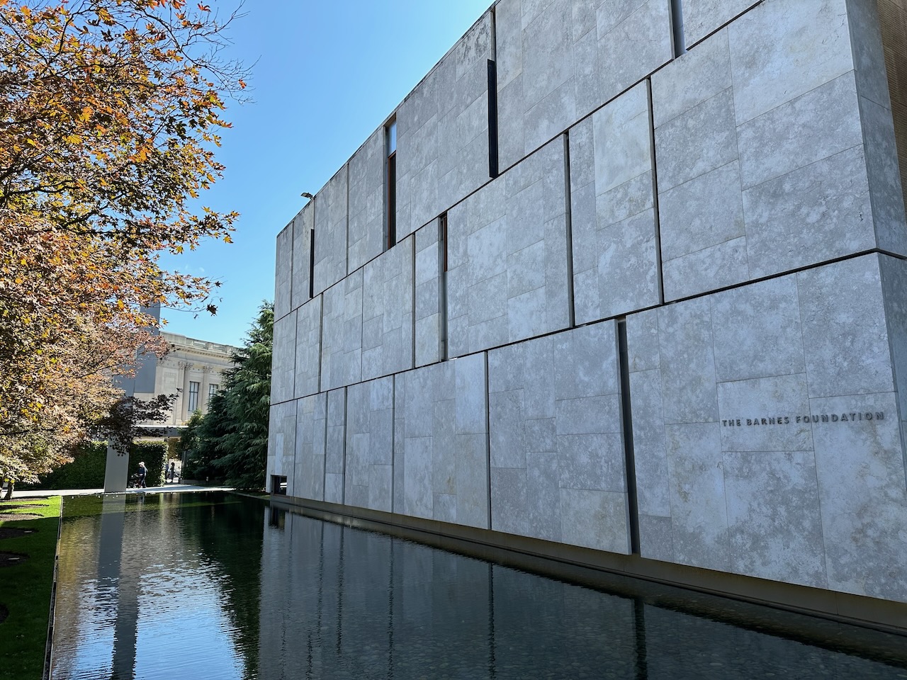 Exterior of the Barnes Foundation, with pool in front of building.