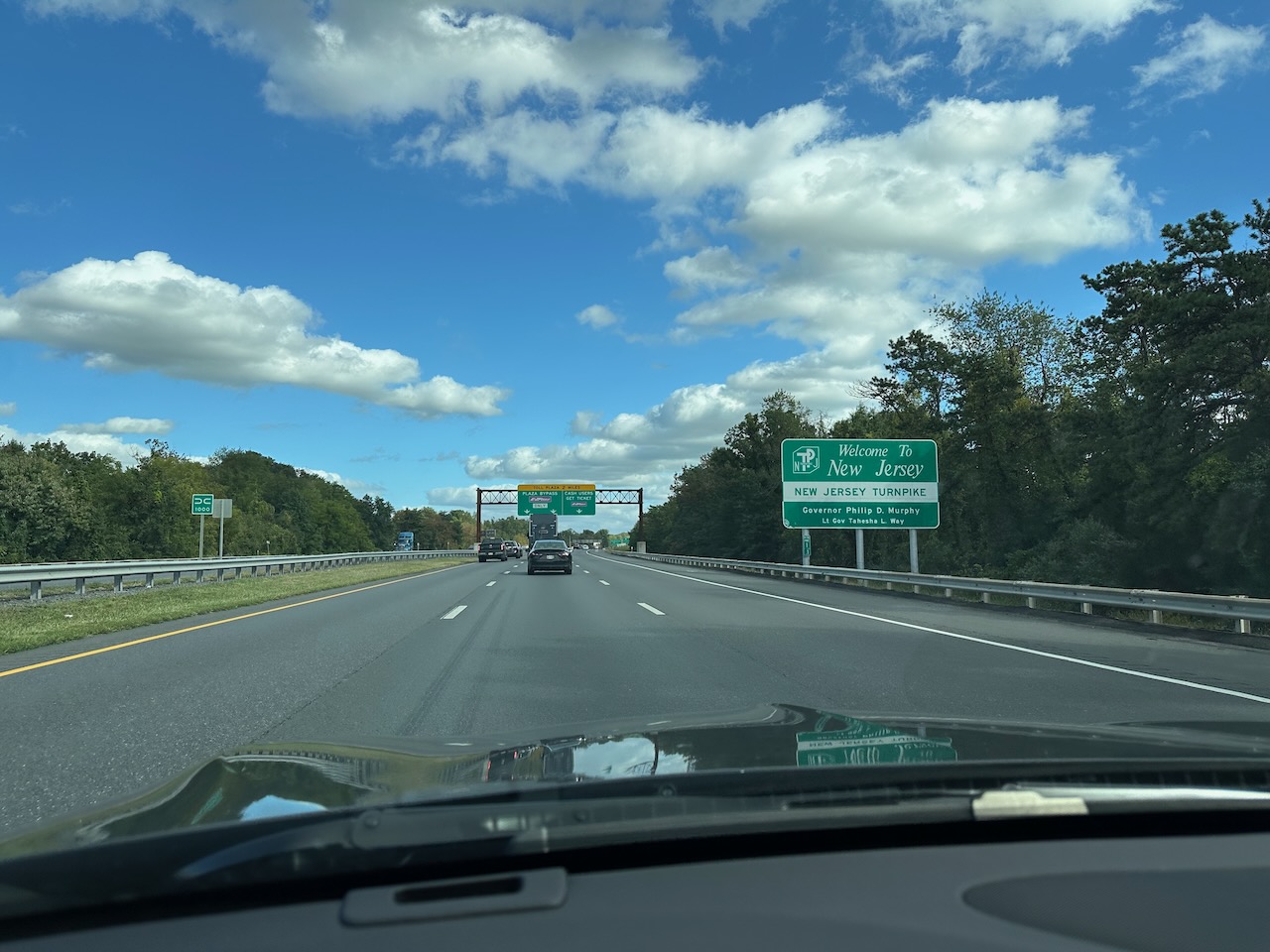 Welcome to NJ sign beside NJ Turnpike.