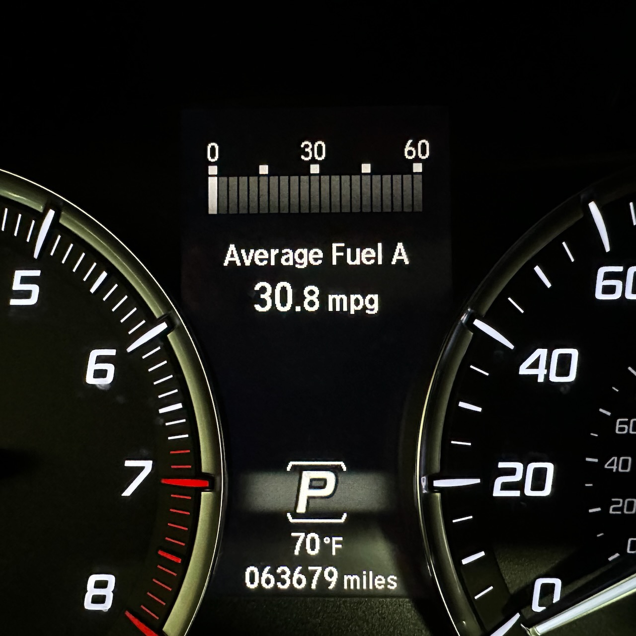 Car odometer reading 63679 miles.