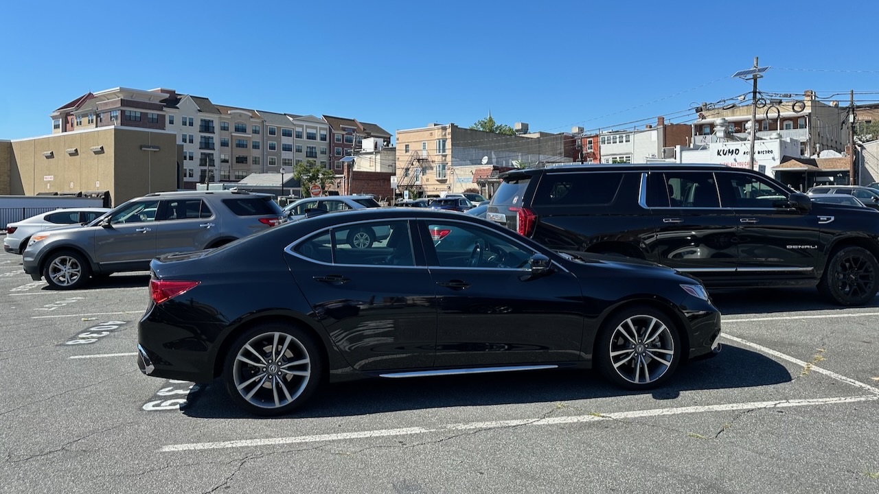 2020 Acura TLX parked in municipal lot.