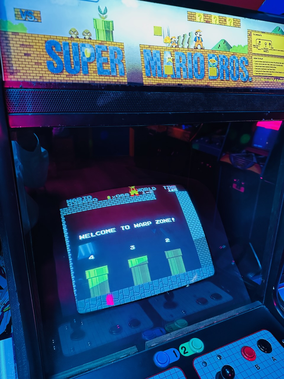 Super Mario Bros cabinet, with warp screen showing. 