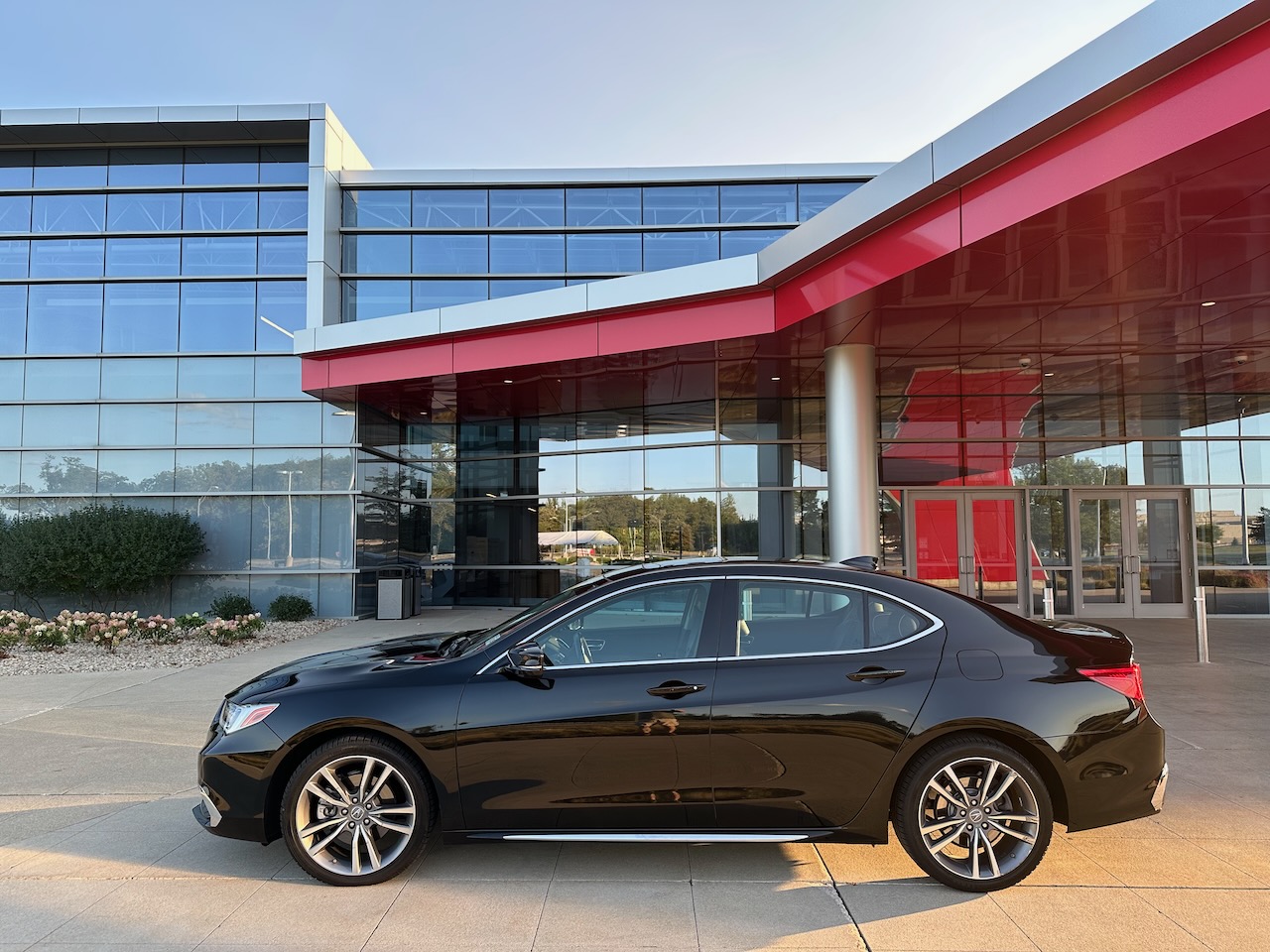 2020 Acura TLX parked in front of Honda Heritage Center.