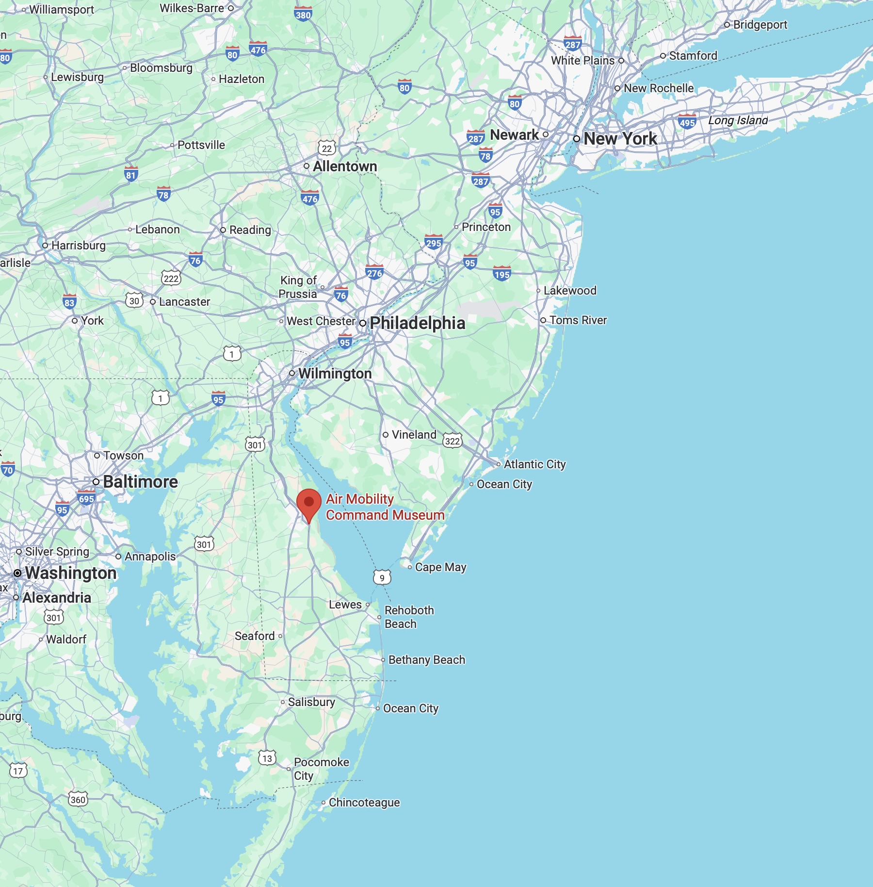 Map of New Jersey and Delaware, with red pin in location of Dover, Delaware.