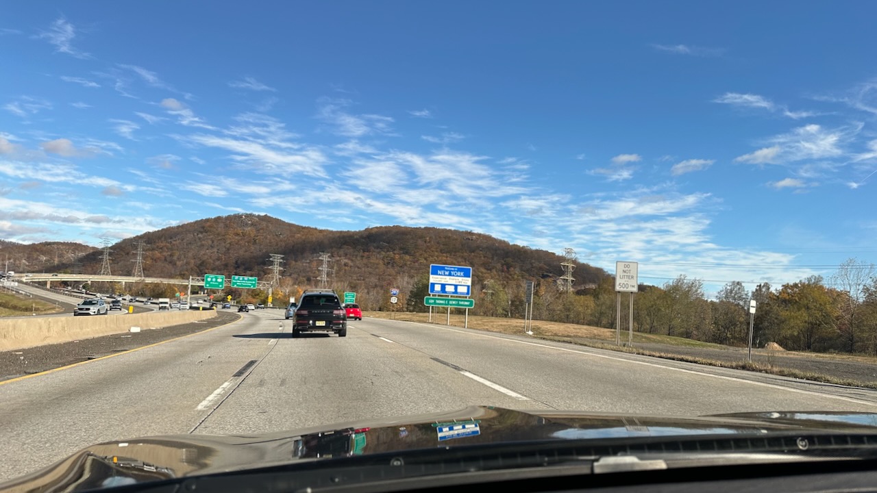 View of Welcome to New York sign along I-87. 