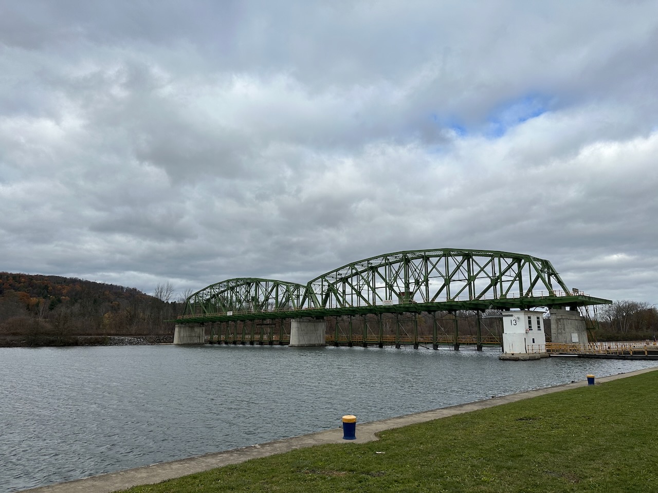 Erie Canal Lock and Dam 13, under a gray, cloudy sky.