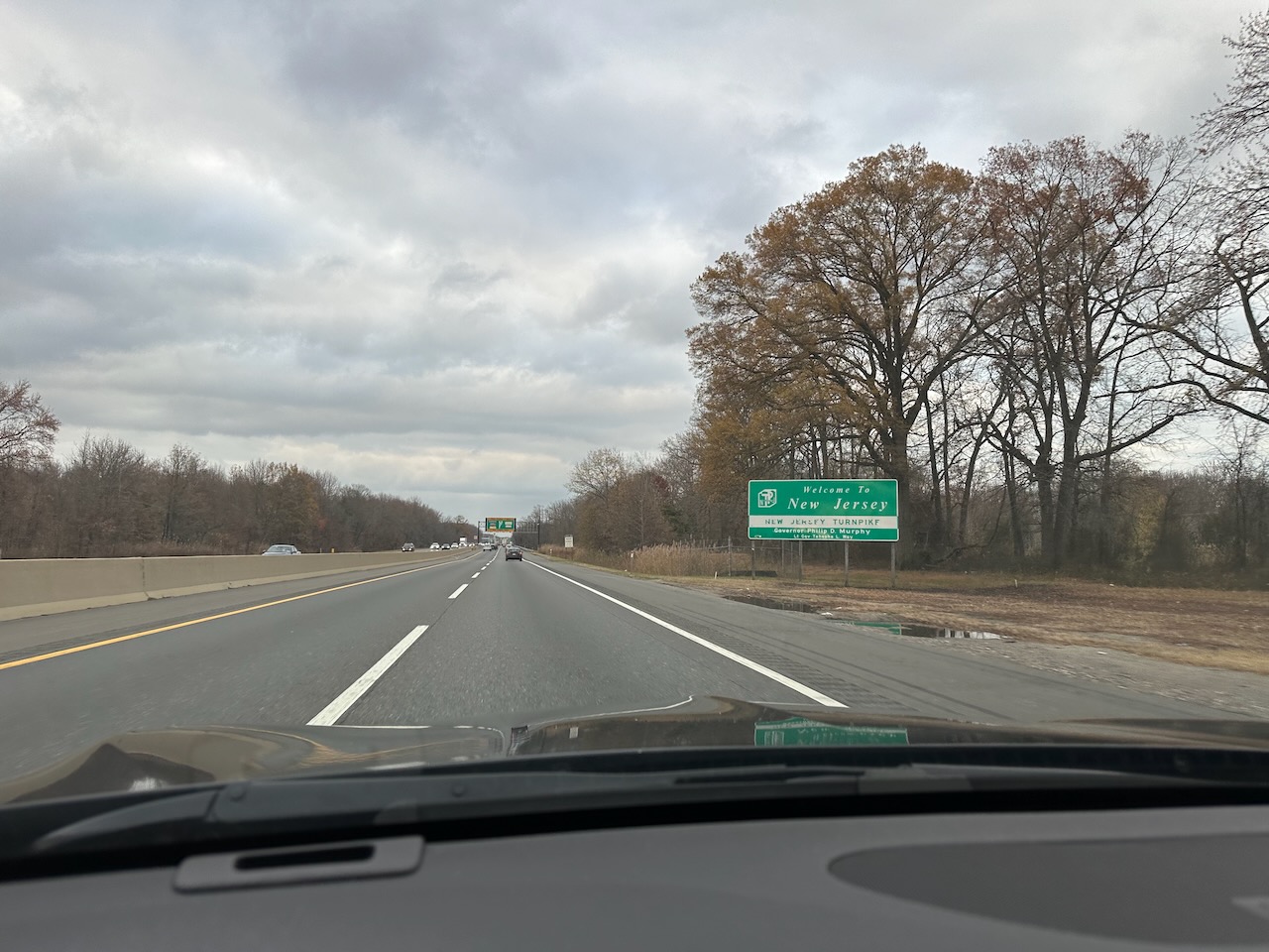 Welcome to New Jersey sign along side of highway. 