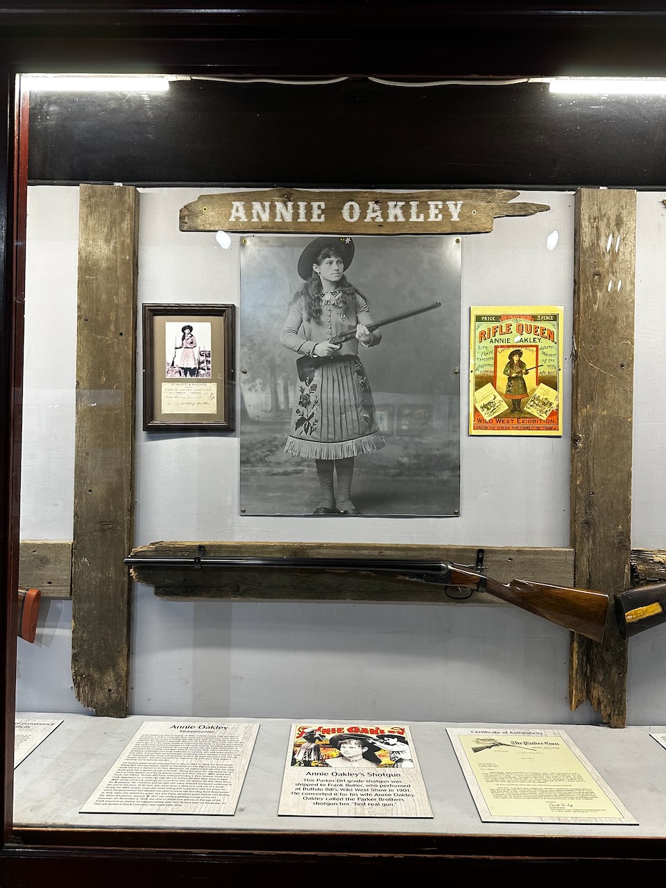 Display of Annie Oakley and her gun. 