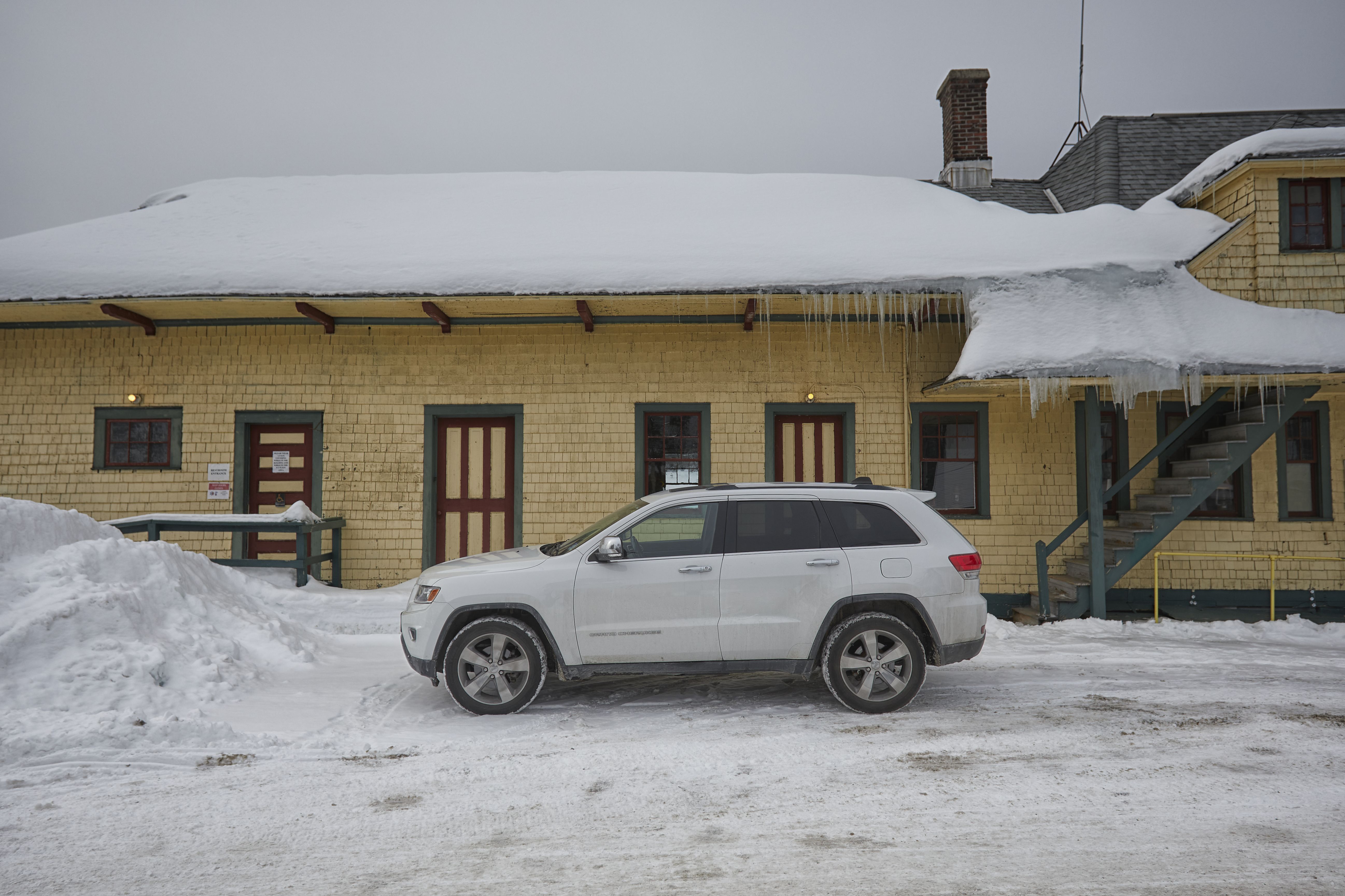 2014 Jeep Grand Cherokee parked in front of Thendara Station.
