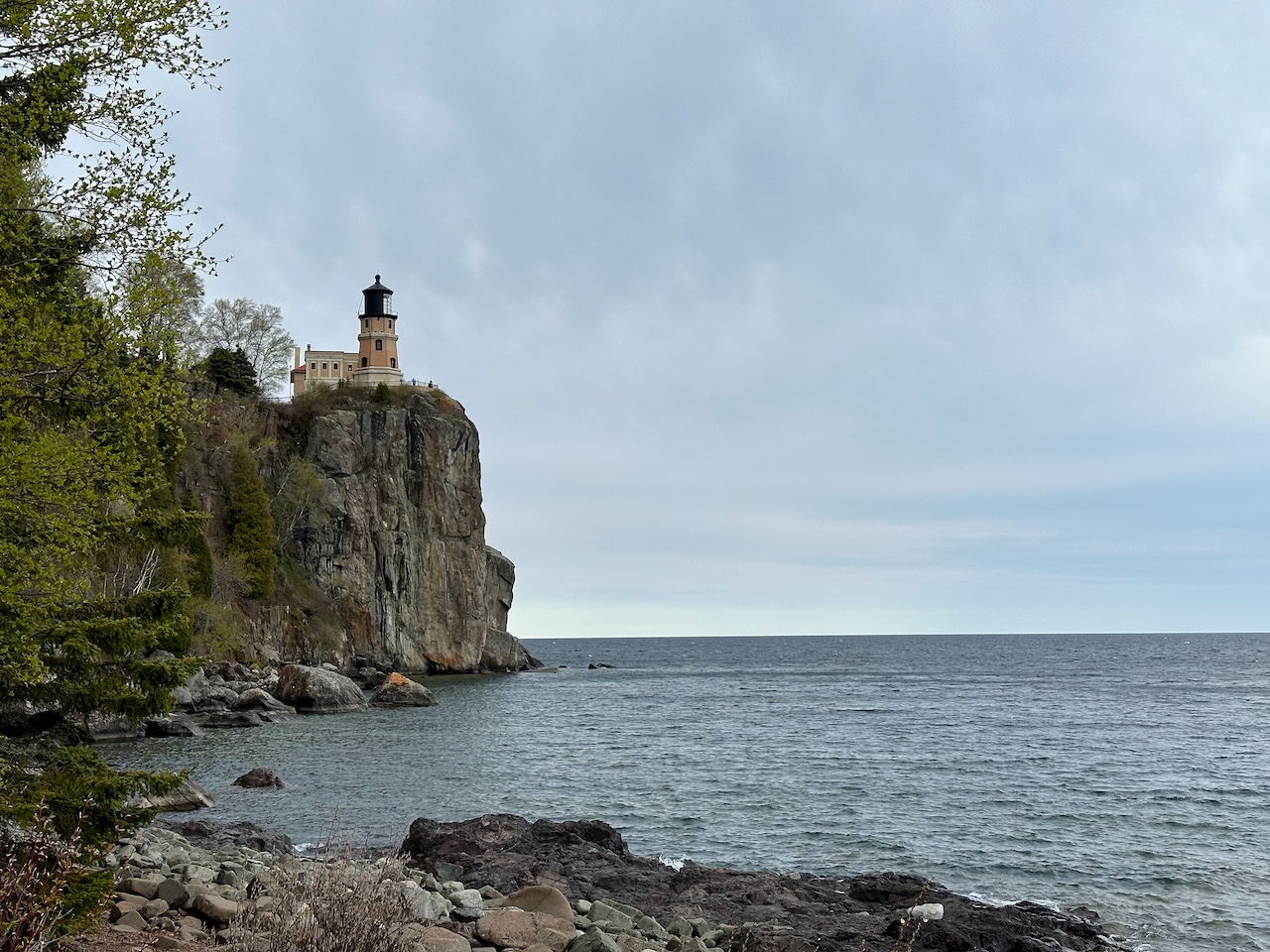 Split Rock Lighthouse on cliff above Lake Superior.