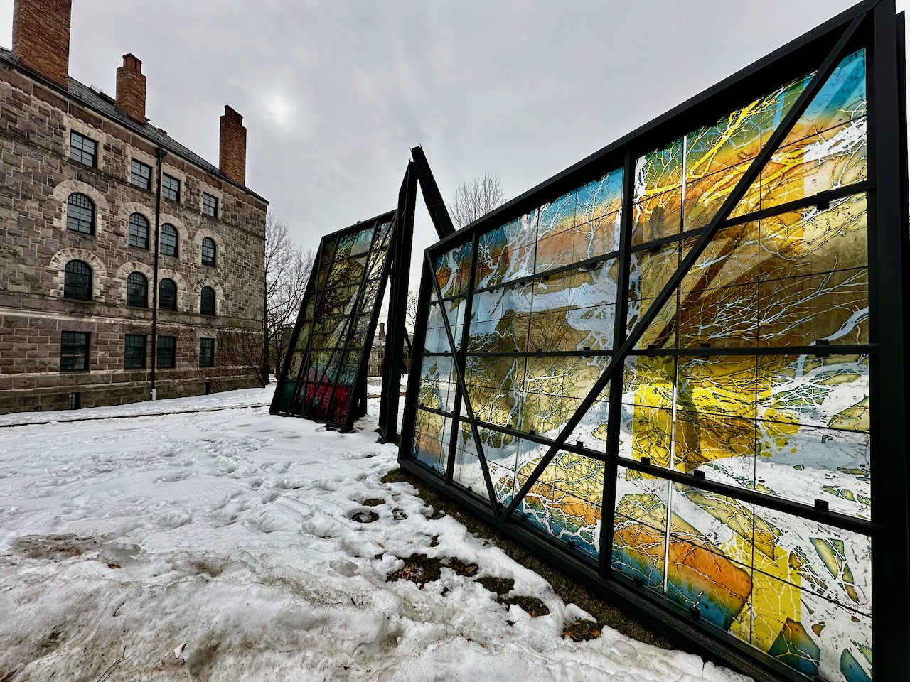 Art installation of stained glass titled Any Body Oddly Propped.