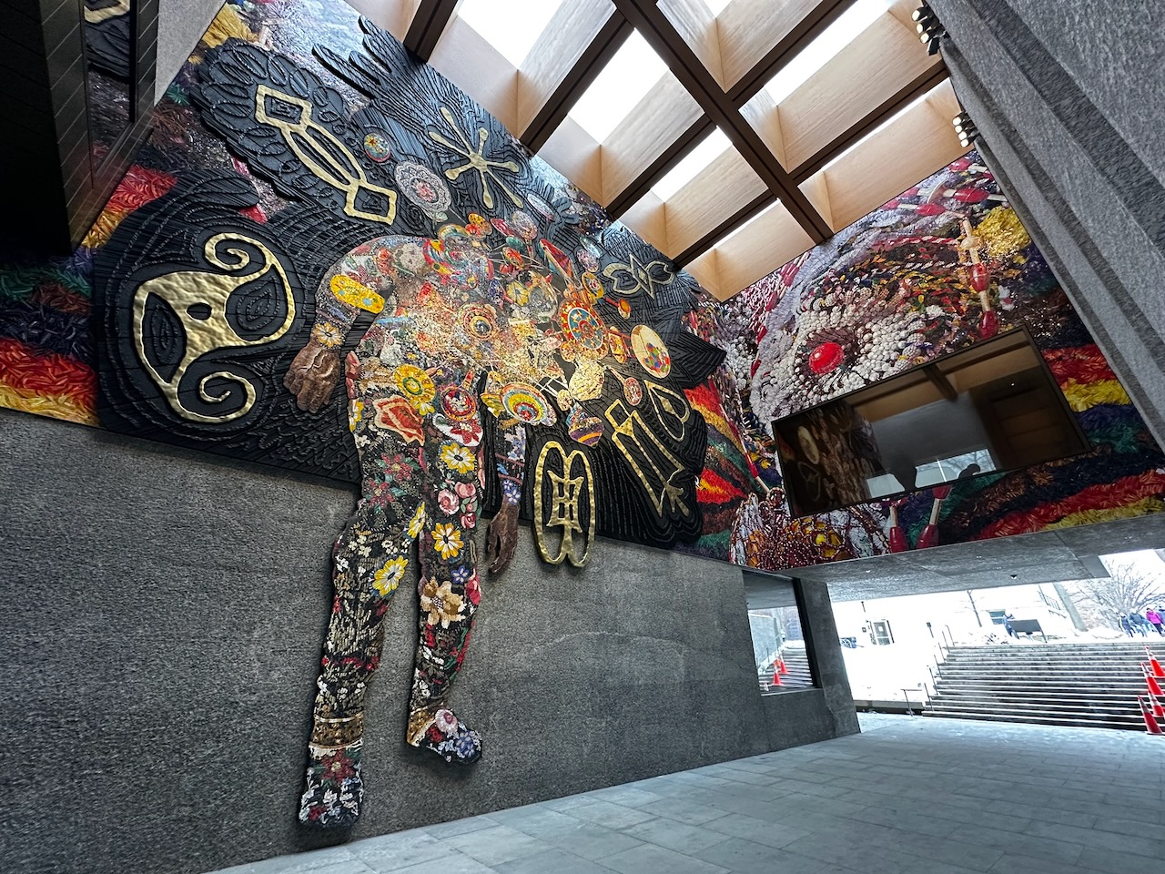 Forty-foot tall figure clad in suit of flowers