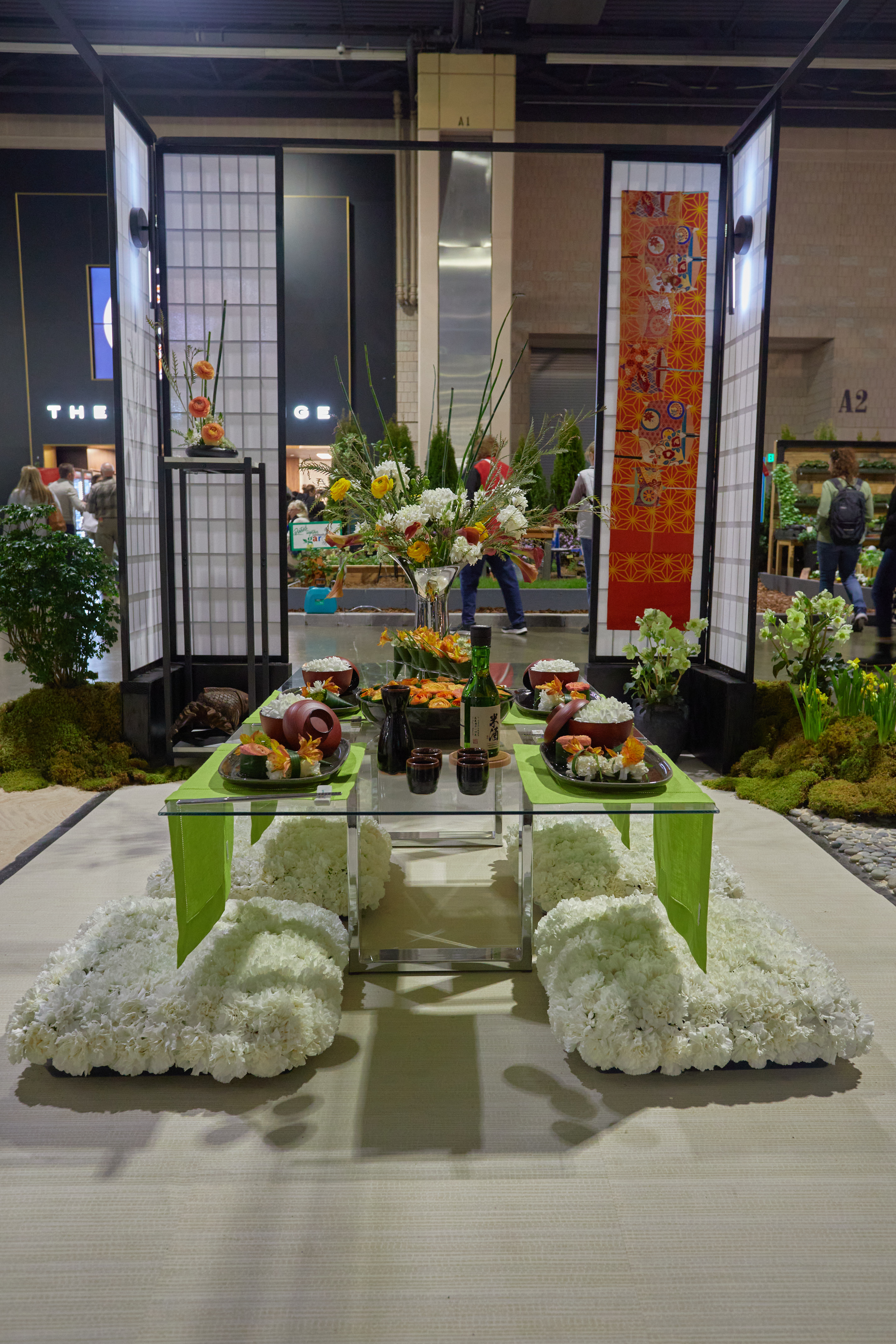 Japanese dining room, with sushi and decorations made from flowers.