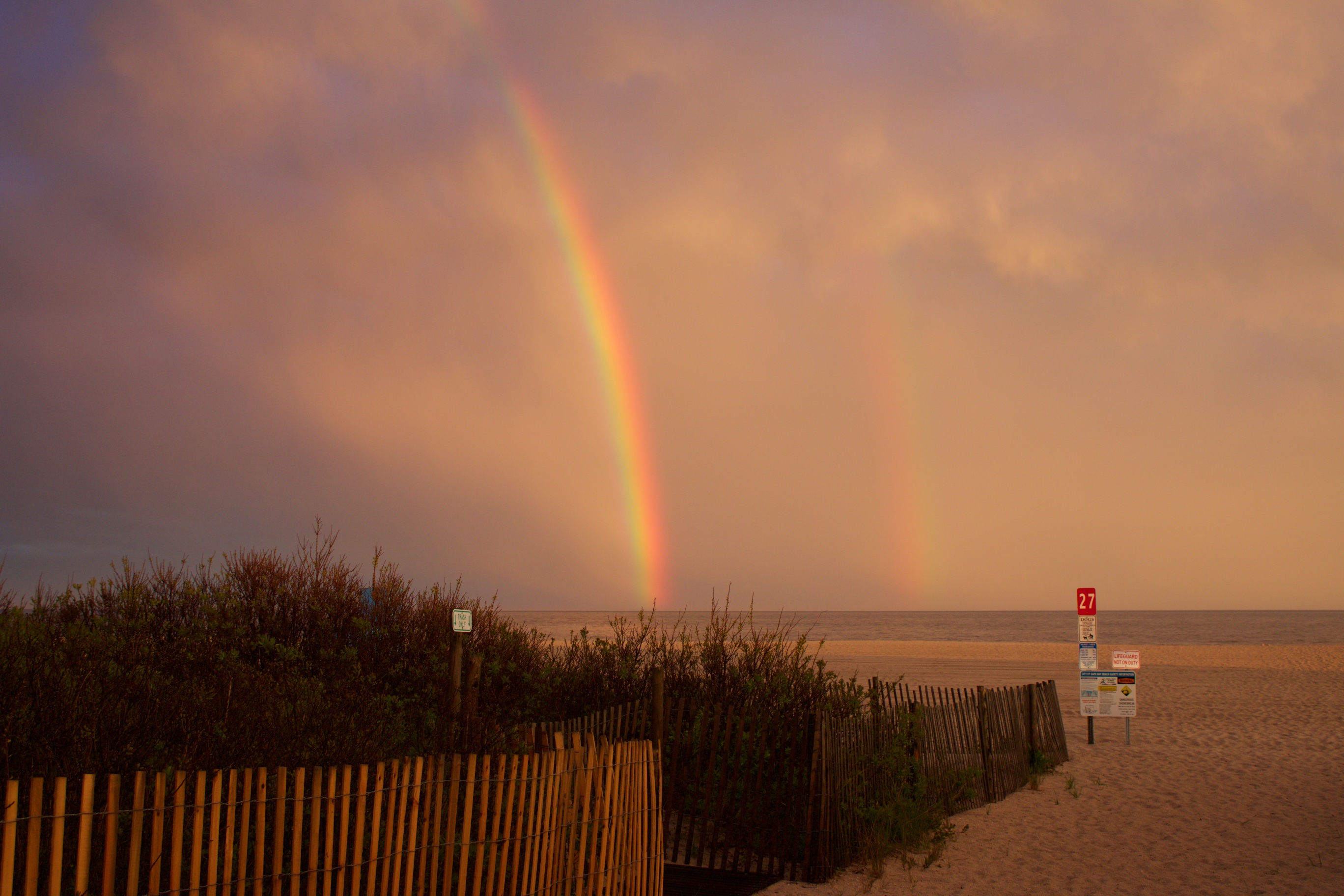 Rainbow over beach in Cape May, New Jersey.