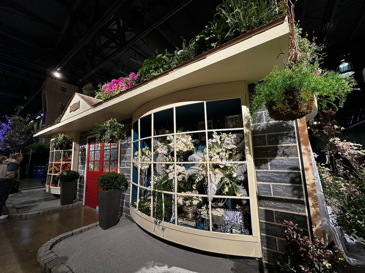 Recreation of floral store in convention hall. 