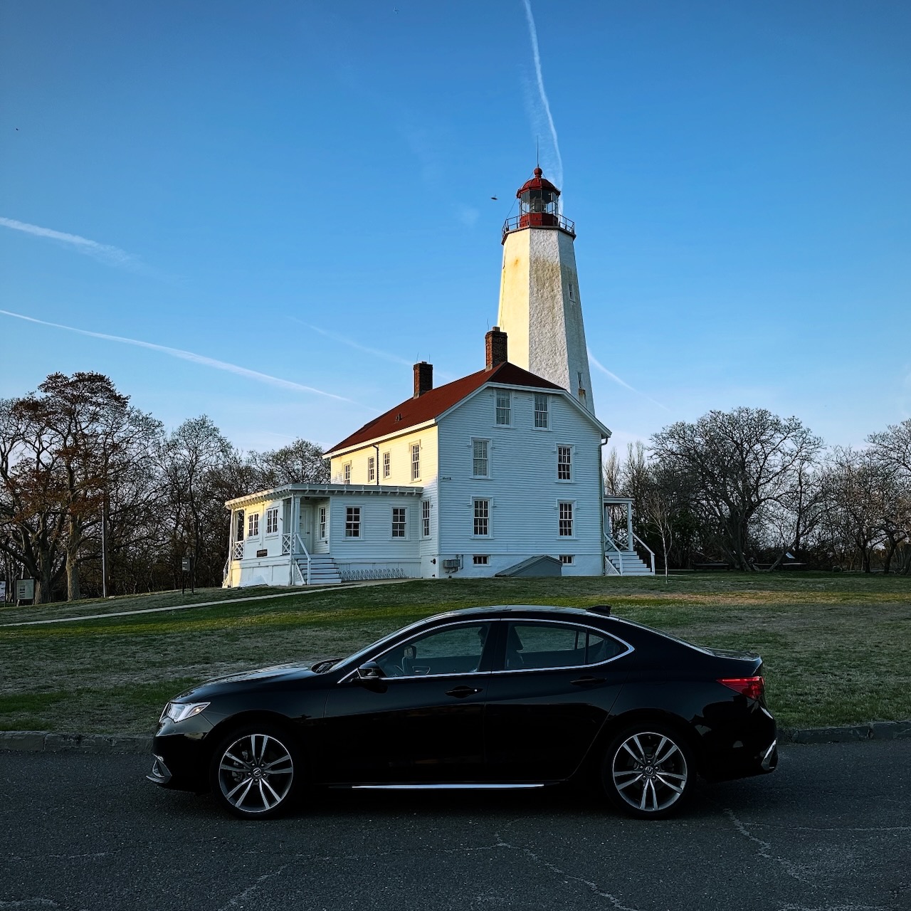 2020 Acura TLX parked in front of Sandy Hook Lighthouse.