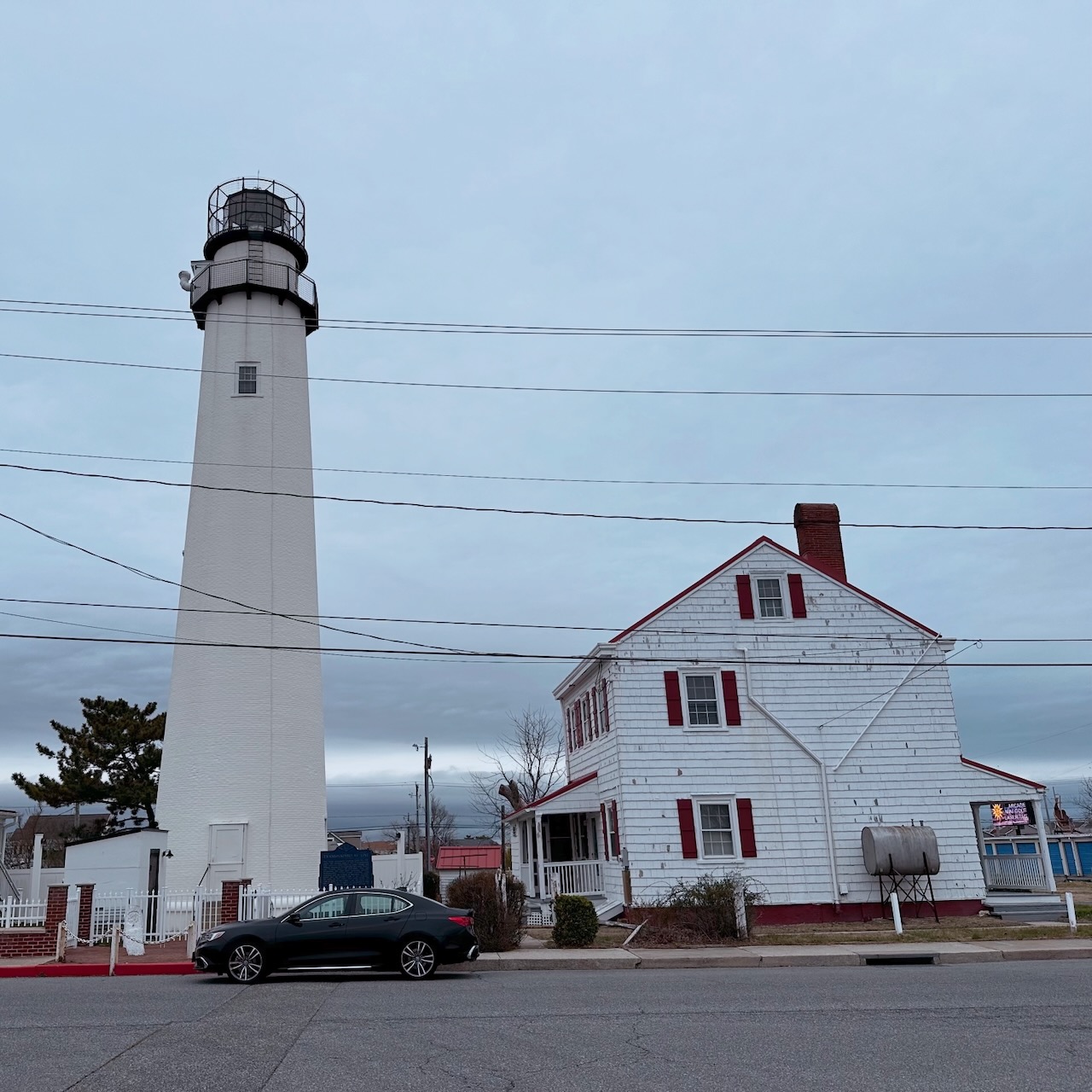 2020 Acura TLX parked in front of Fenwick Island Light.