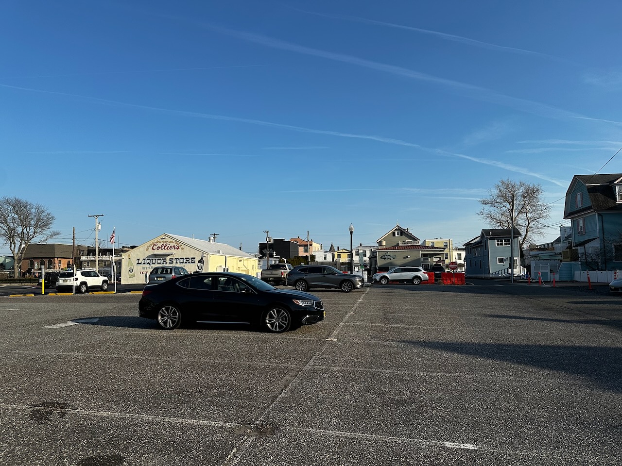 2020 Acura TLX parked in empty parking lot.