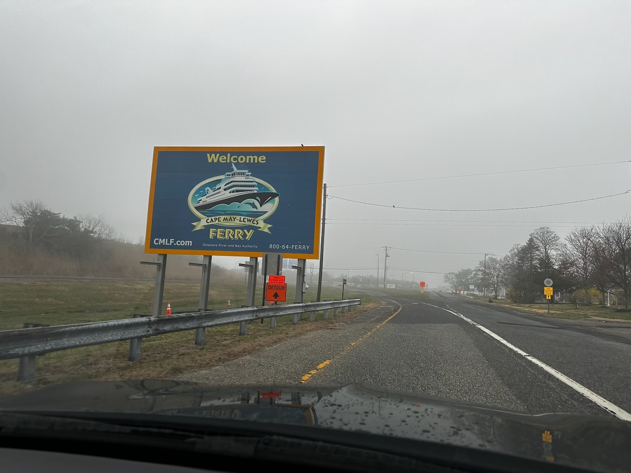 Route 9, with sign for Cape May-Lewes Ferry on side of road.
