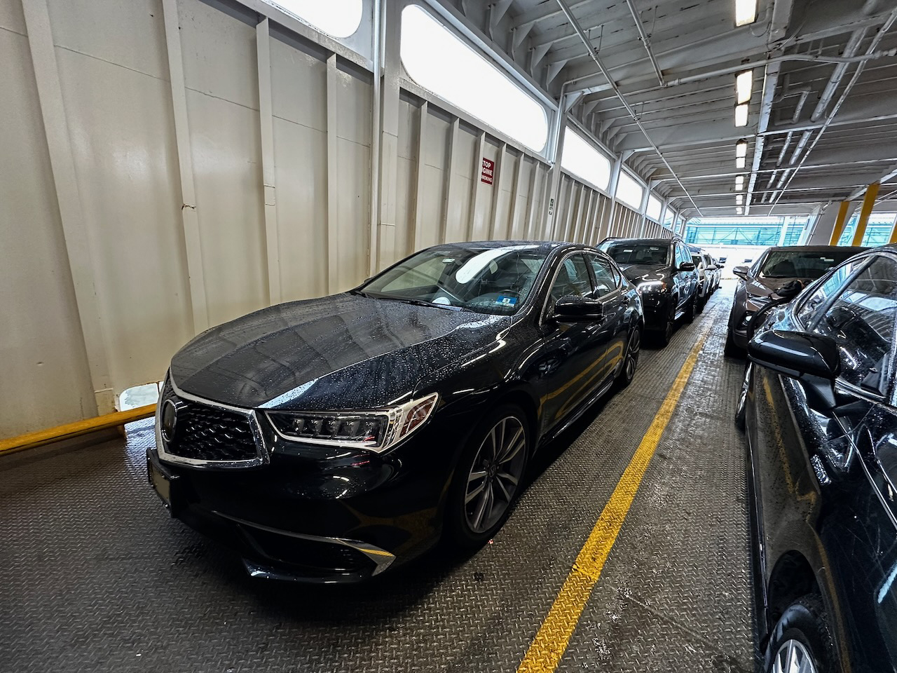 2020 Acura TLX parked on vehicle deck of ferry.