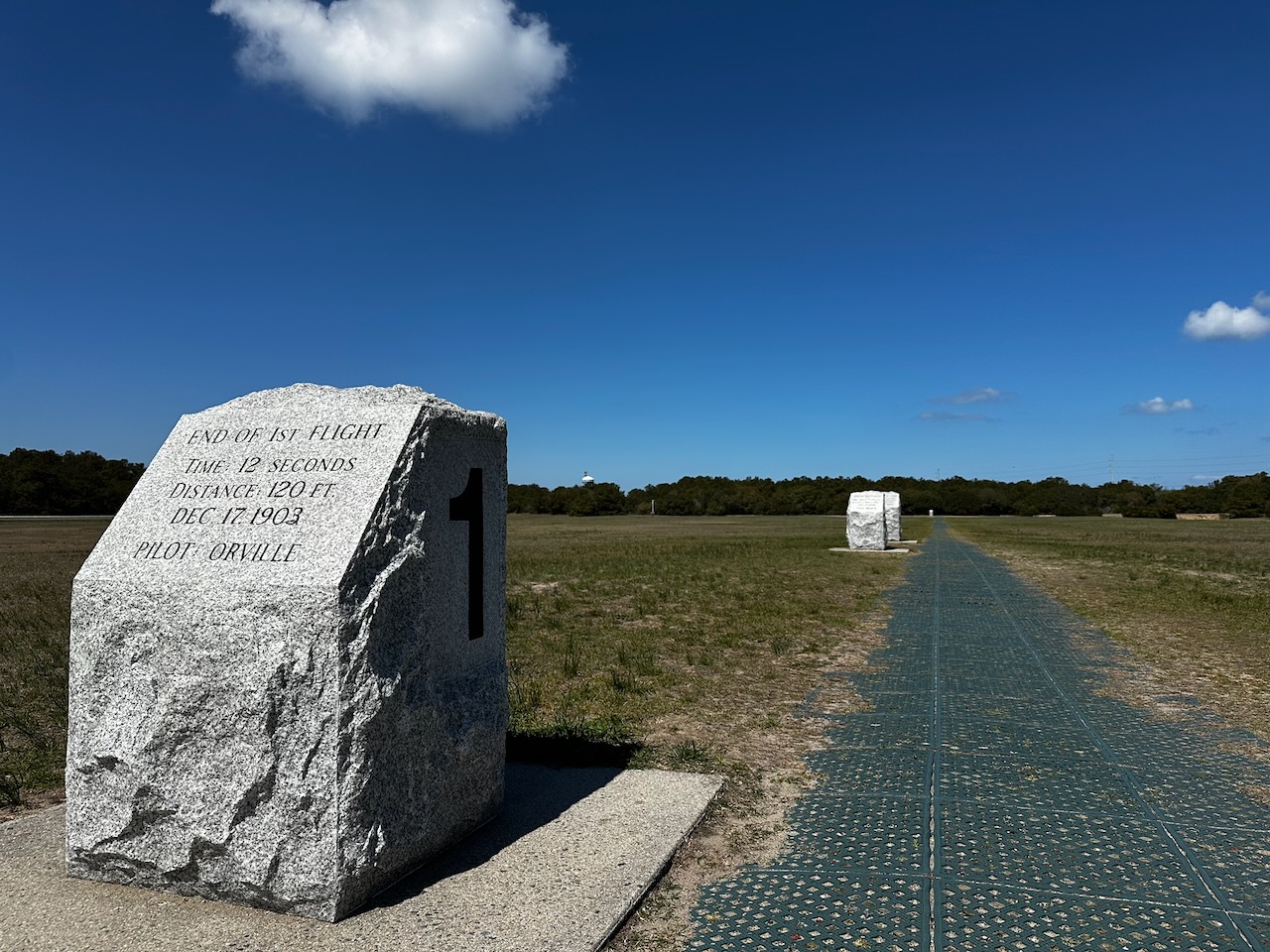 Stone marker with #1 on side.