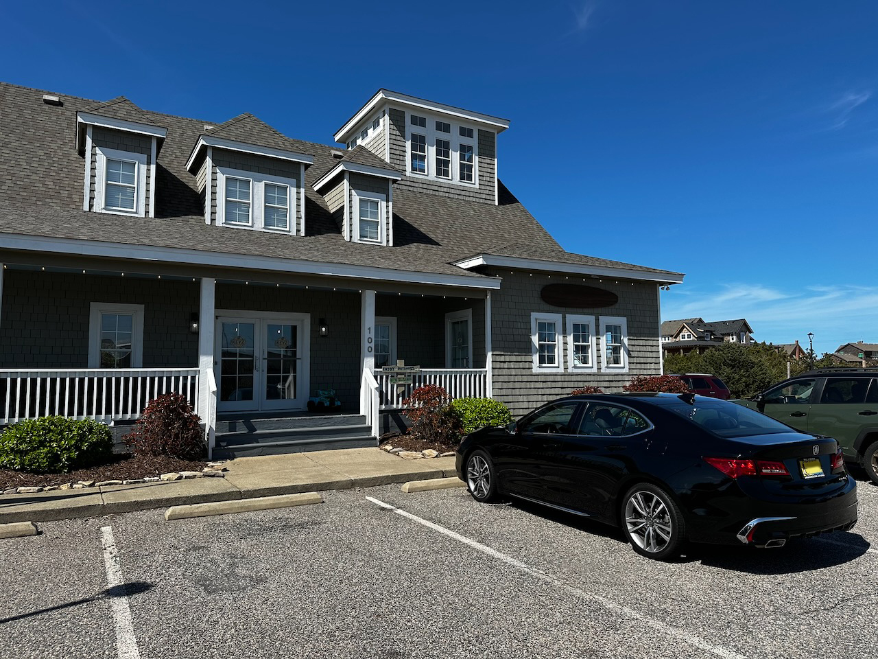 2020 Acura TLX parked in front of Keyz Ice Cream.