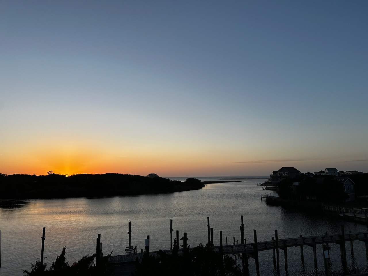 View of inlet and Pamlico Sound at dusk.