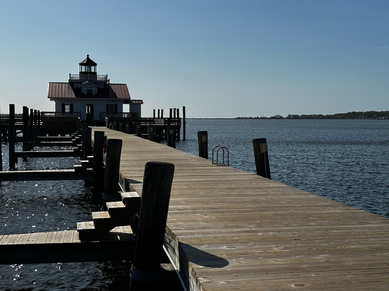 Roanoke Marshes Lighthouse at end of pier.
