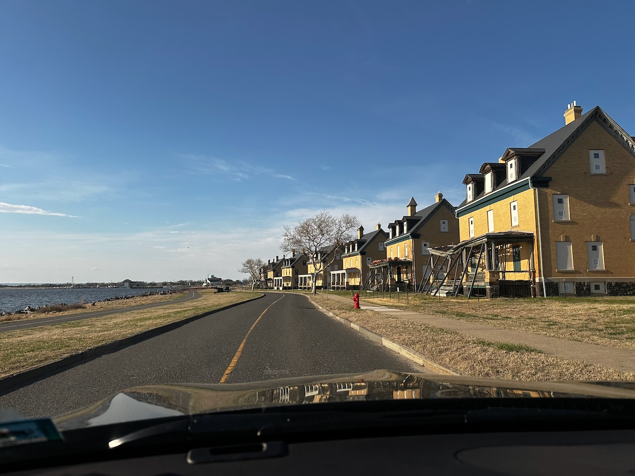 Officers row of houses, many undergoing repair or shored up with supporting timber.