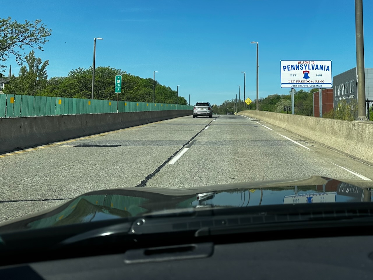 View of Welcome to Pennsylvania sign along side of highway.