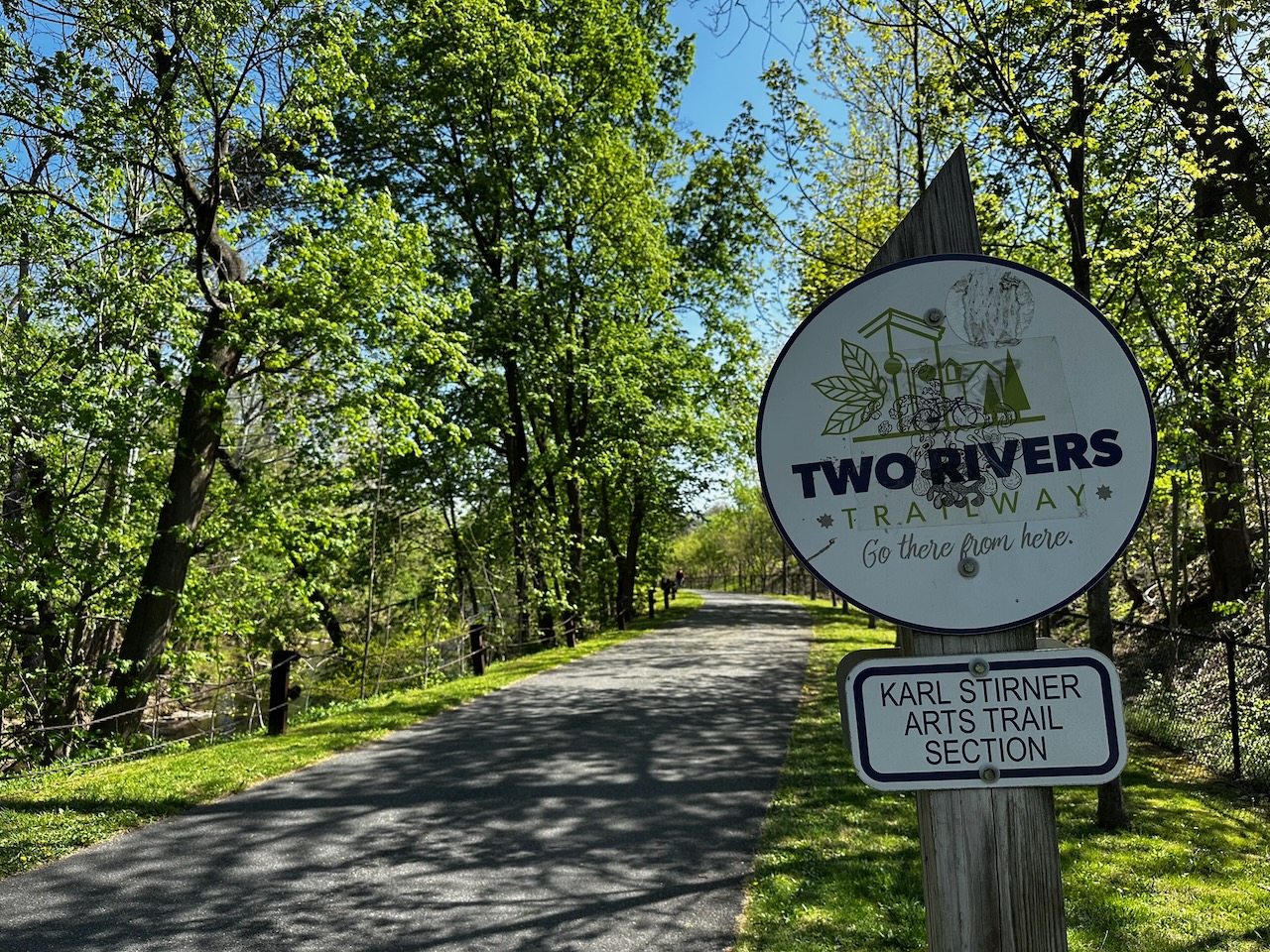 Sign for Two Rivers Trailway and Karl Stirner Arts Trail.